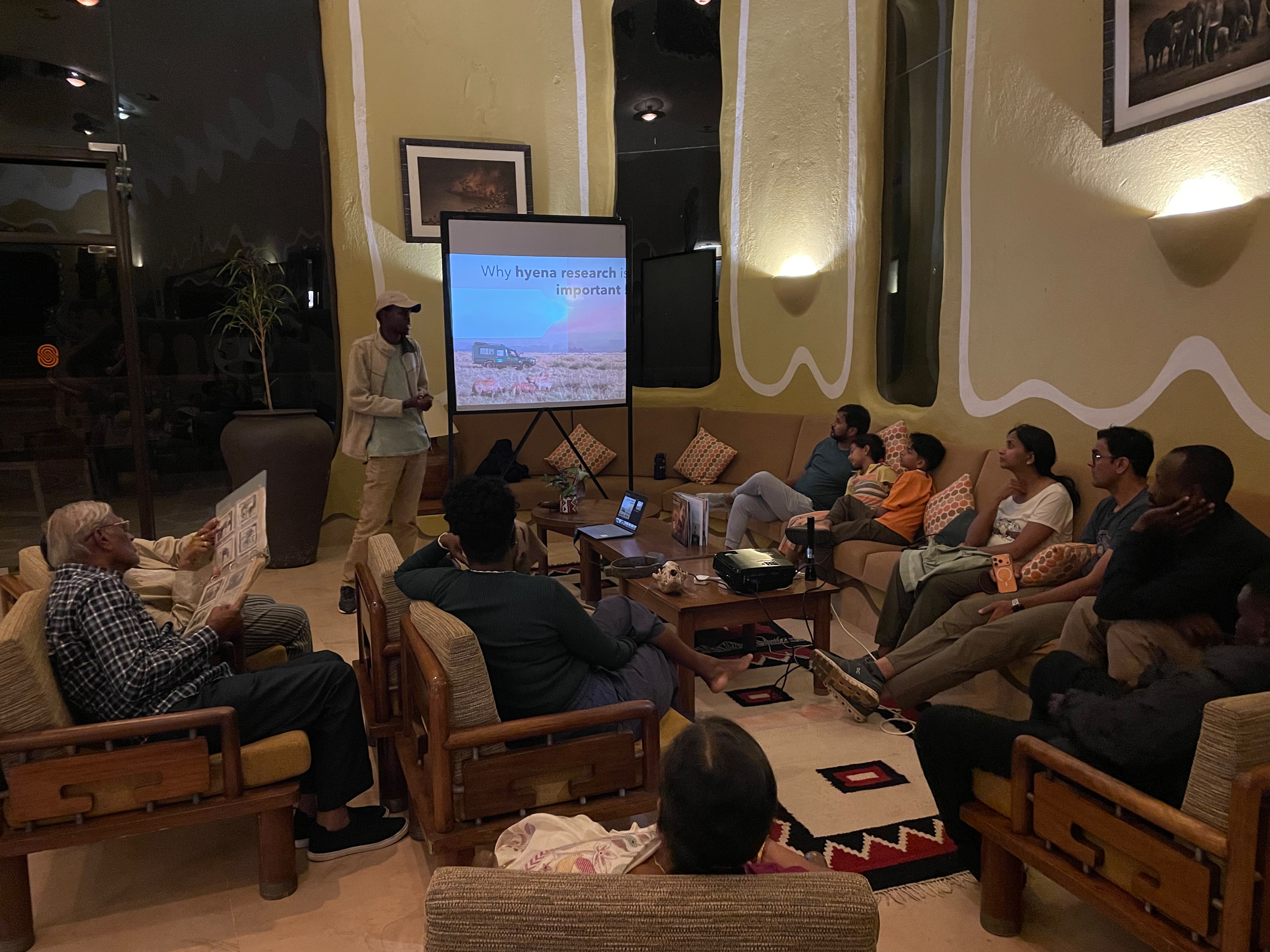 MHP team member giving a hyena talk at a safari lodge.